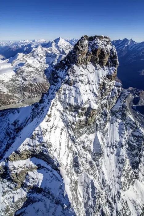 Framed Print : The massive shape of the Matterhorn sorrounded by its mountain range covered in snow, Swiss Canton of Valais, Swiss Alps, Switzerland, Europe Framed Print : The massive shape of the Matterhorn sorrounded by its mountain range covered in snow, Swiss Canton of Valais, Swiss Alps, Switzerland, Europe