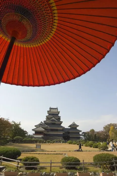 Framed Print : Matsumoto Castle under red parasol