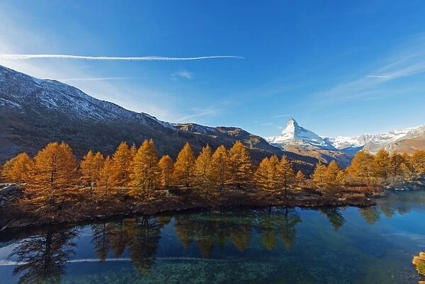 The Matterhorn, 4478m, and Grindjisee mountain lake in autumn, Zermatt, Valais, Swiss Alps