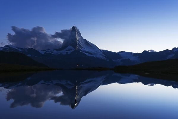 The Matterhorn, 4478m, illuminated in honour of the 150th anniversary of the first ascent