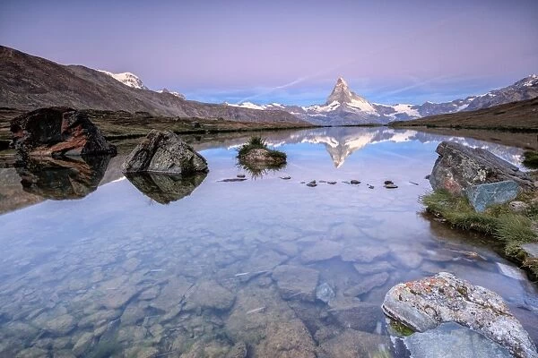 The Matterhorn reflected in Lake Stellisee at dawn, Zermatt, Canton of Valais, Pennine Alps