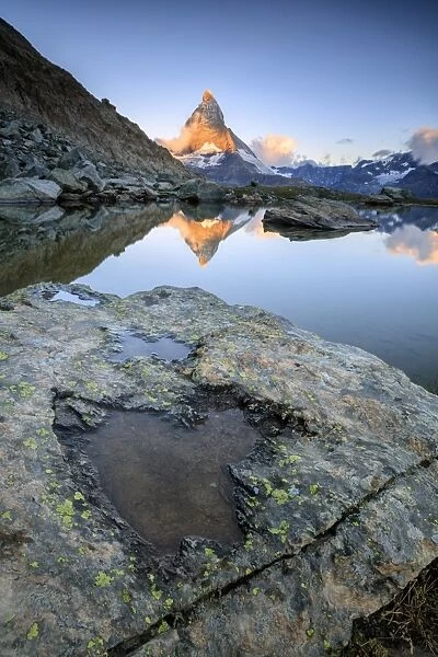 The Matterhorn reflected in Lake Stellisee at dawn, Zermatt, Pennine Alps, Canton of Valais