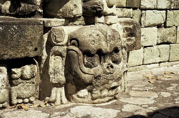 Mayan carved stone skull on top of East Court