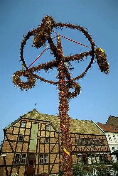 Maypole and half timbered houses in 16th century Lilla