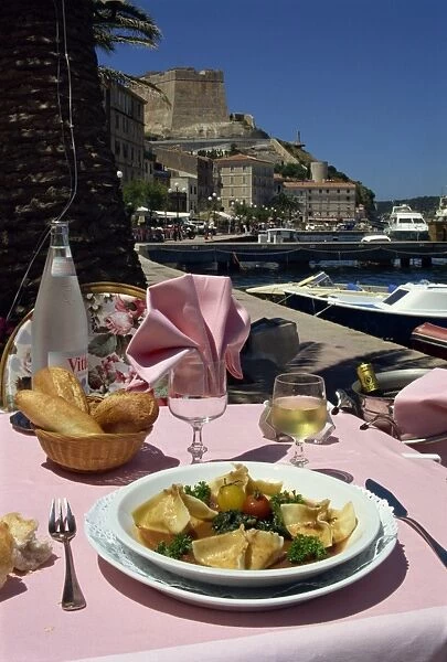 Meal on an outdoor table of the La Caravelle Restaurant, Bonifacio, Corsica