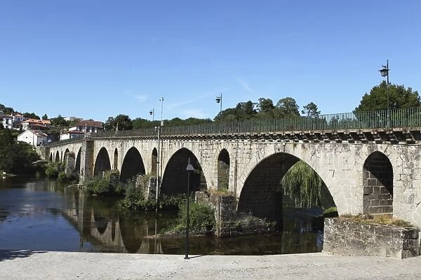 The medieval arched stone bridge across the River Lima at the town of Ponte da Barca