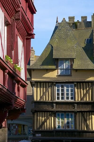 Medieval corbelled and half timbered mansions, in cobbled street, Old Town, Dinan, Brittany, Cotes d Armor, France, Europe