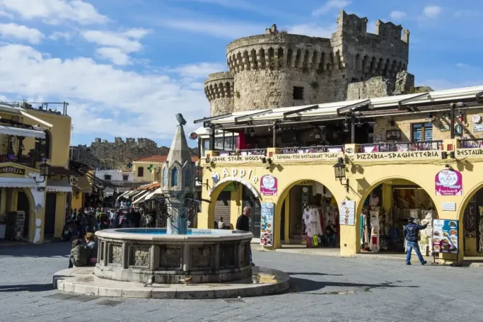 Framed Print : Medieval fountain at Hippokratous Square, the Medieval Old Town, UNESCO World Heritage Site Framed Print : Medieval fountain at Hippokratous Square, the Medieval Old Town, UNESCO World Heritage Site