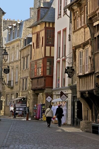 Medieval half timbered houses in streets of old town, Dinan, Brittany, France, Europe