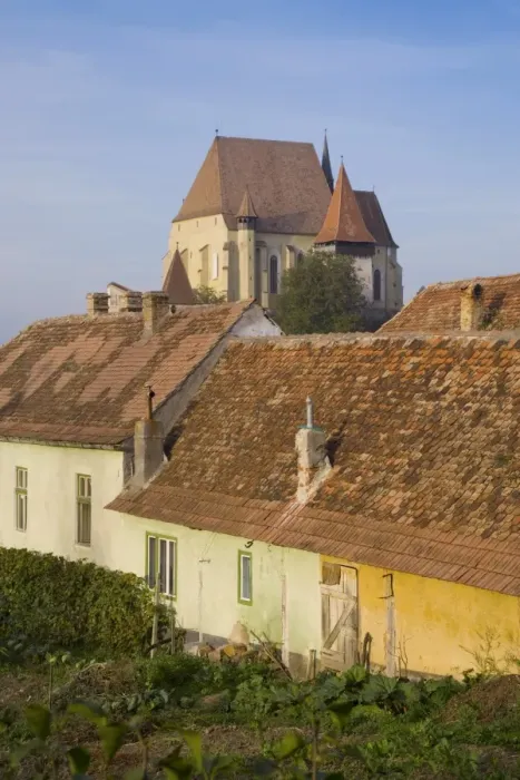Framed Print : Medieval Roma village on the fortified church route, 15th century fortified church Framed Print : Medieval Roma village on the fortified church route, 15th century fortified church