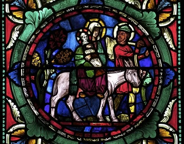 Medieval stained glass depicting Mary, baby Jesus and Joseph on a donkey, Canterbury Cathedral, UNESCO World Heritage Site, Canterbury, Kent, England, United Kingdom, Europe