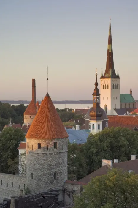 Framed Print : Medieval town walls and spire of St. Olavs church at dusk, Tallinn Framed Print : Medieval town walls and spire of St. Olavs church at dusk, Tallinn