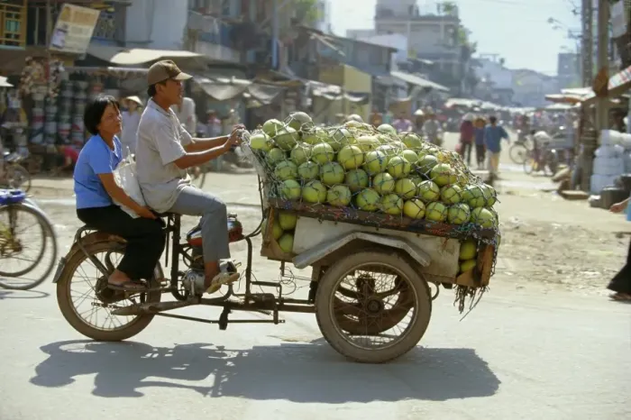 Framed Print : Melons being transported on three wheeler Xe Lam in downtown area Framed Print : Melons being transported on three wheeler Xe Lam in downtown area