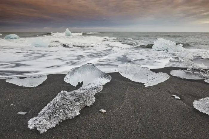 Framed Print : Melting glacial ice, carved from the Vatnajokull icecap, on the beach at Jokulsarlon Framed Print : Melting glacial ice, carved from the Vatnajokull icecap, on the beach at Jokulsarlon