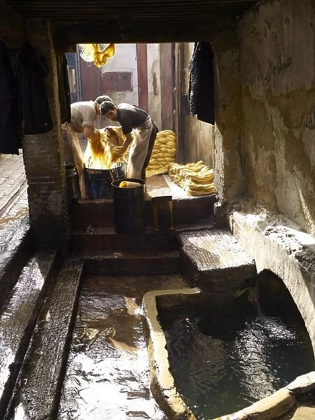 Men dyeing silk in the street, Fez, Morocco, North Africa, Africa