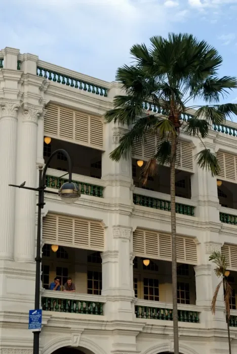 Framed Print : Two men enjoying a drink on balcony of Raffles Hotel Framed Print : Two men enjoying a drink on balcony of Raffles Hotel