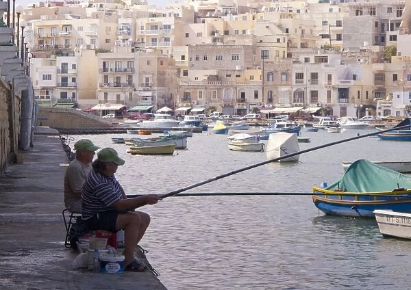 Two men fishing, Marsaskala, Malta, Mediterranean, Europe