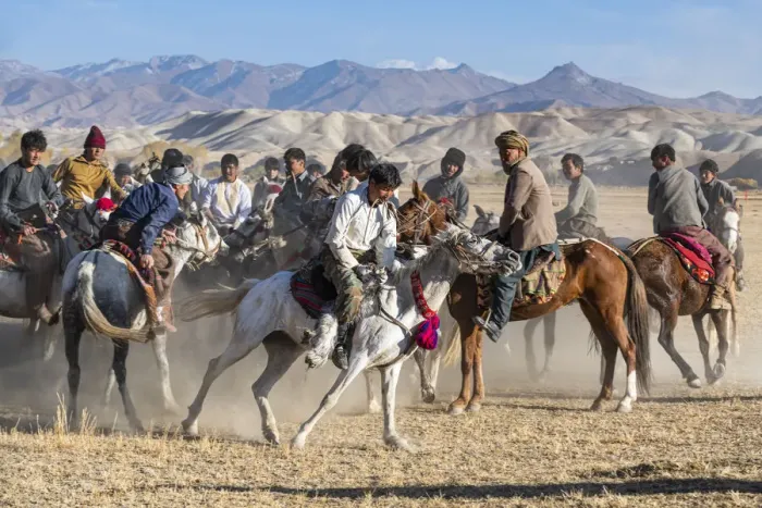 Framed Print : Men practising a traditional Buzkashi game, Yaklawang, Afghanistan, Asia Framed Print : Men practising a traditional Buzkashi game, Yaklawang, Afghanistan, Asia