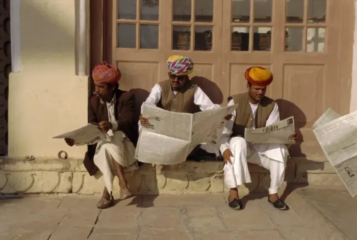 Framed Print : Men reading newspapers Framed Print : Men reading newspapers
