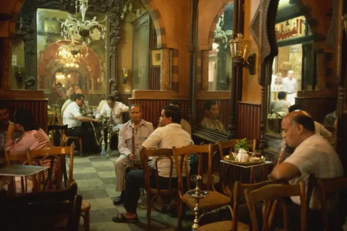 Framed Print : Men smoking hookahs in the interior of the El Fishawy Coffee House in Khan al-Kalili Bazaar in Cairo, Egypt, North Framed Print : Men smoking hookahs in the interior of the El Fishawy Coffee House in Khan al-Kalili Bazaar in Cairo, Egypt, North