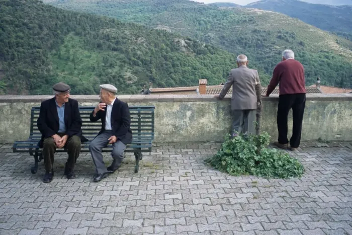 Framed Print : Men watching procession Framed Print : Men watching procession