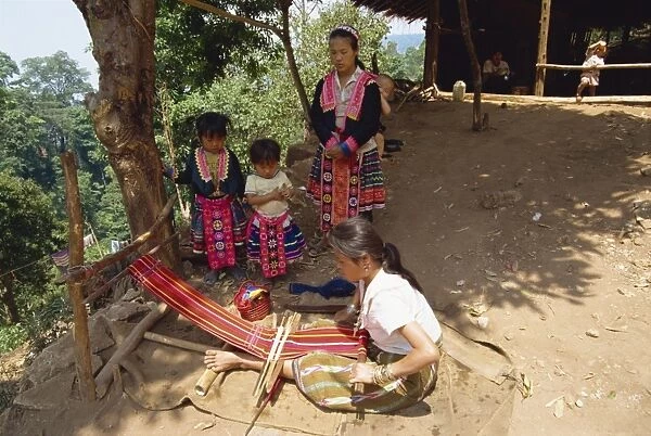 Meo hill tribe woman weaving
