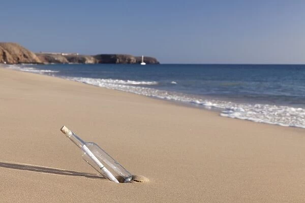 Message in a bottle, Playa Papagayo beach, near Playa Blanca, Lanzarote, Canary Islands