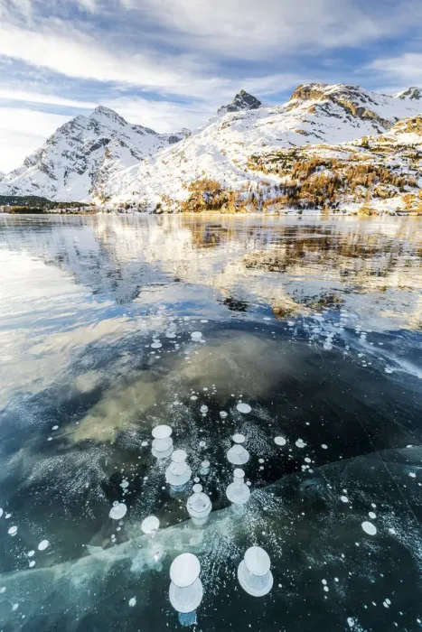 Framed Print : Methane bubbles in the icy surface of Silsersee with snowy peak, Lake Sils Framed Print : Methane bubbles in the icy surface of Silsersee with snowy peak, Lake Sils