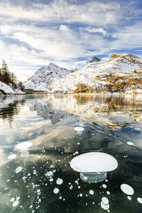 Framed Print : Methane bubbles in the icy surface of Silsersee with snowy peak, Lake Sils Framed Print : Methane bubbles in the icy surface of Silsersee with snowy peak, Lake Sils