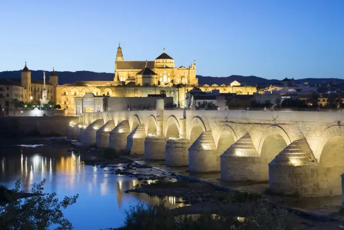 Framed Print : The Mezquita and Roman Bridge over the river Guadalquivir floodlit at night, Cordoba Framed Print : The Mezquita and Roman Bridge over the river Guadalquivir floodlit at night, Cordoba