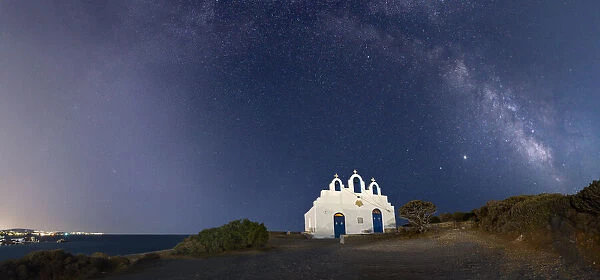 Milky Way arches above Agios Georgios on Paros Island, Cyclades, Greek Islands, Greece