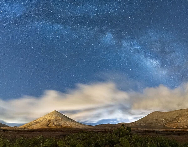 Milky Way in the night sky over Montana del Fronton mountain, La Oliva, Fuerteventura