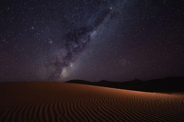 Milky Way rising over the sand dunes of Sossusvlei, Namibia, Africa
