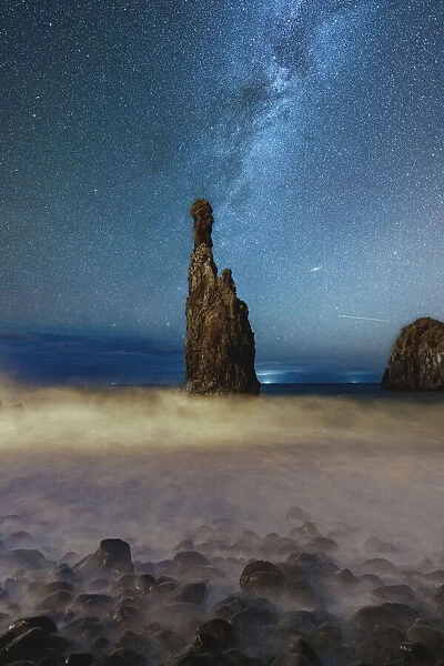 Milky Way shining on sharp rock formation of Ilheus da Rib