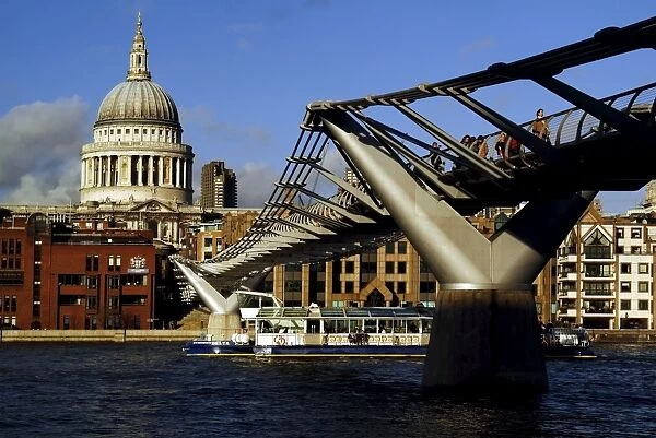 The Millennium Bridge across the River Thames, with St. Pauls Cathedral beyond