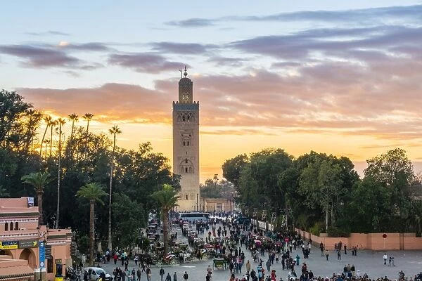 Minaret of the Koutoubia Mosque at sunset, from Jmaa El-Fna square, Marrakesh, Morocco