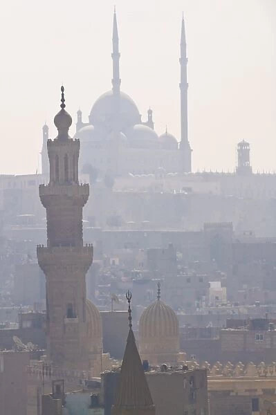 The minarets of the mosques of the old city in the smog, Cairo, Egypt, North Africa