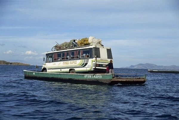 Minibus crossing Lake Titicaca on a ferry in Bolivia, South America
