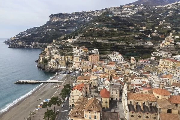 Minori, beach, town, cathedral and terraced hillsides with view to Ravello, elevated view