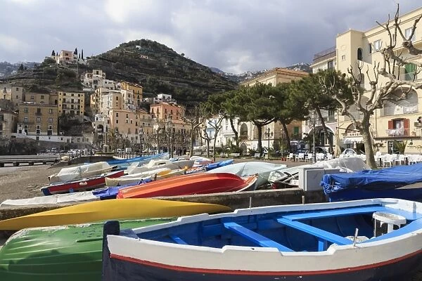 Minori, colourful boats on the beach with promenade in early spring, Costiera Amalfitana