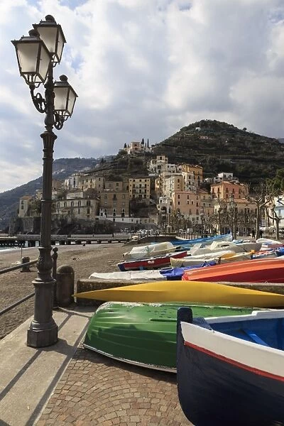 Minori, colourful boats on the promenade with beach in early spring, Costiera Amalfitana