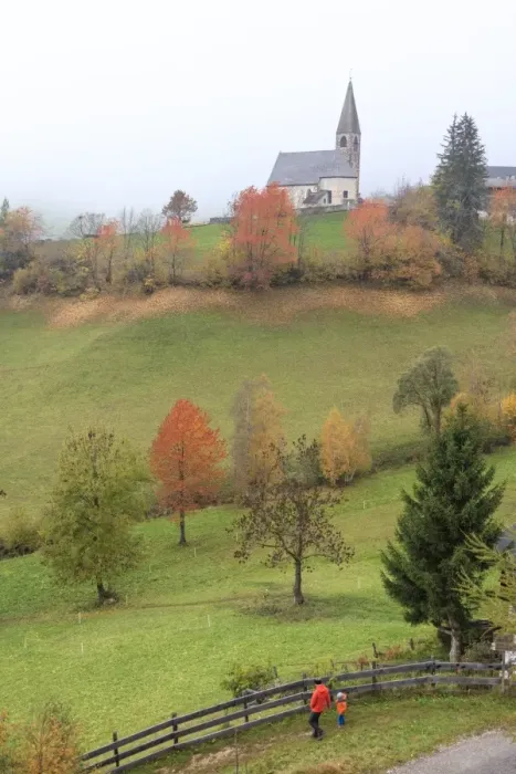 Framed Print : Mist and colourful trees surround the alpine church in the fall, St. Magdalena, Funes Valley Framed Print : Mist and colourful trees surround the alpine church in the fall, St. Magdalena, Funes Valley