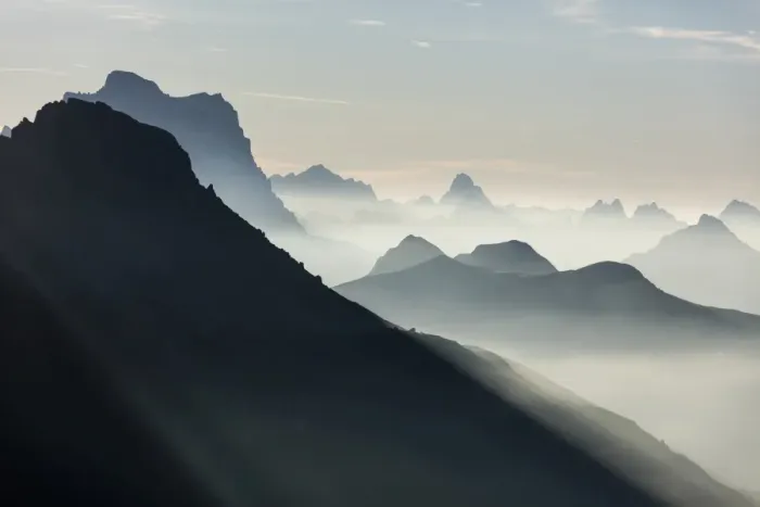 Framed Print : Mist on peaks of Dolomites and Monte Pelmo seen from Cima Belvedere at dawn, Val di Fassa Framed Print : Mist on peaks of Dolomites and Monte Pelmo seen from Cima Belvedere at dawn, Val di Fassa