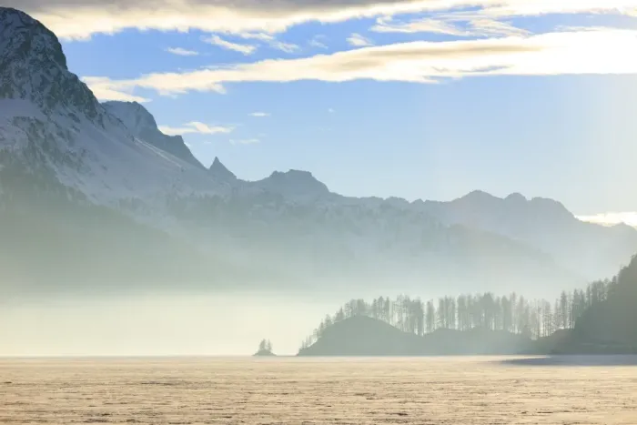 Framed Print : Mist at sunset on Lake Sils covered with snow, Maloja, Engadine, Canton of Graubunden Framed Print : Mist at sunset on Lake Sils covered with snow, Maloja, Engadine, Canton of Graubunden