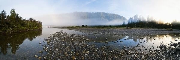 Mist on the Waitangitanoa River at sunrise, Westland National Park, UNESCO World Heritage Site, on the West Coast of South Island, New Zealand, Pacific