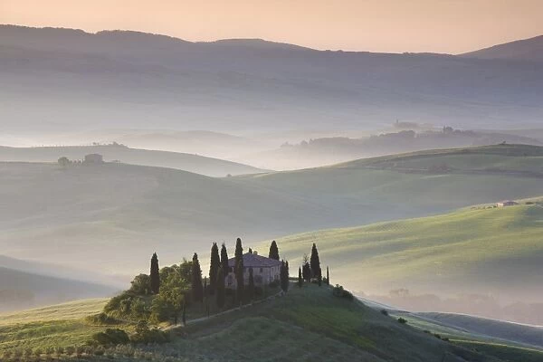 Misty dawn view towards Belvedere, across Val d Orcia, UNESCO World Heritage Site