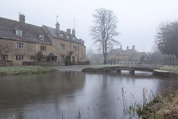 A misty and frosty winters morning, Lower Slaughter, Cotswolds, Gloucestershire, England, United Kingdom, Europe
