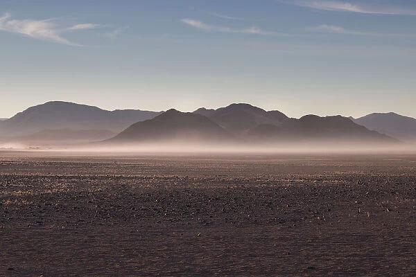 Misty sunrise in the rocky desert, Namibia, Africa