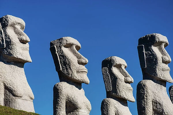 Moai statues against a blue sky, Makomanai Takino Cemetery, Hill of the Buddha, Sapporo, Hokkaido, Japan, Asia