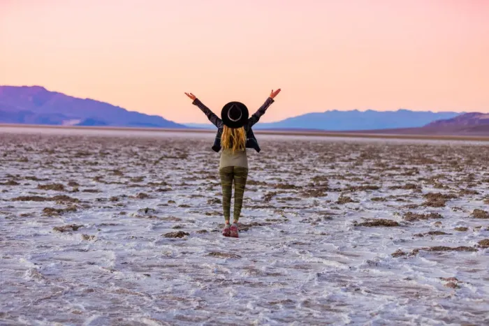 Framed Print : Model posing for the camera at sunset over the salt flats of the Mesquite Dunes Framed Print : Model posing for the camera at sunset over the salt flats of the Mesquite Dunes